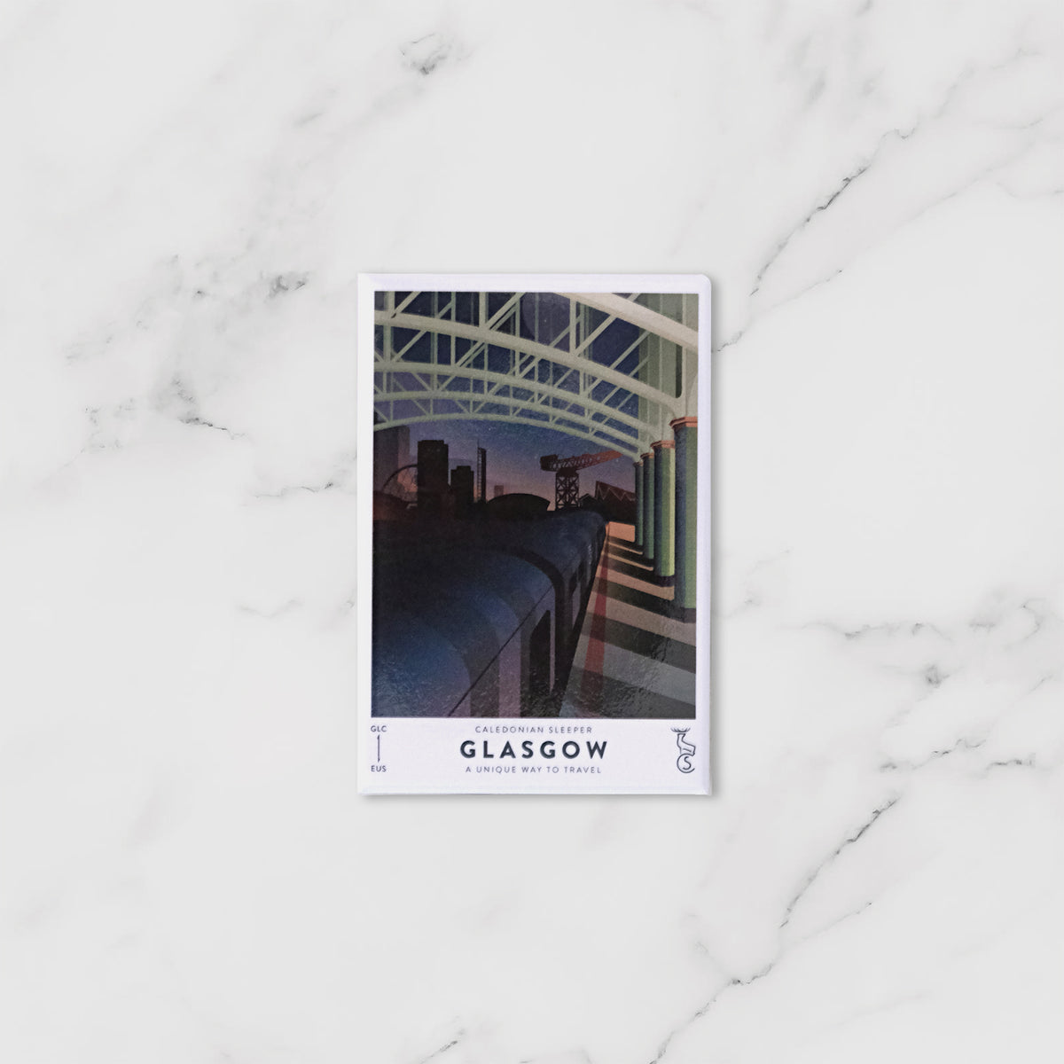Caledonian Sleeper fridge magnet for Glasgow. A City in the Dark' featuring a stylized illustration of a train station platform and key city landmarks